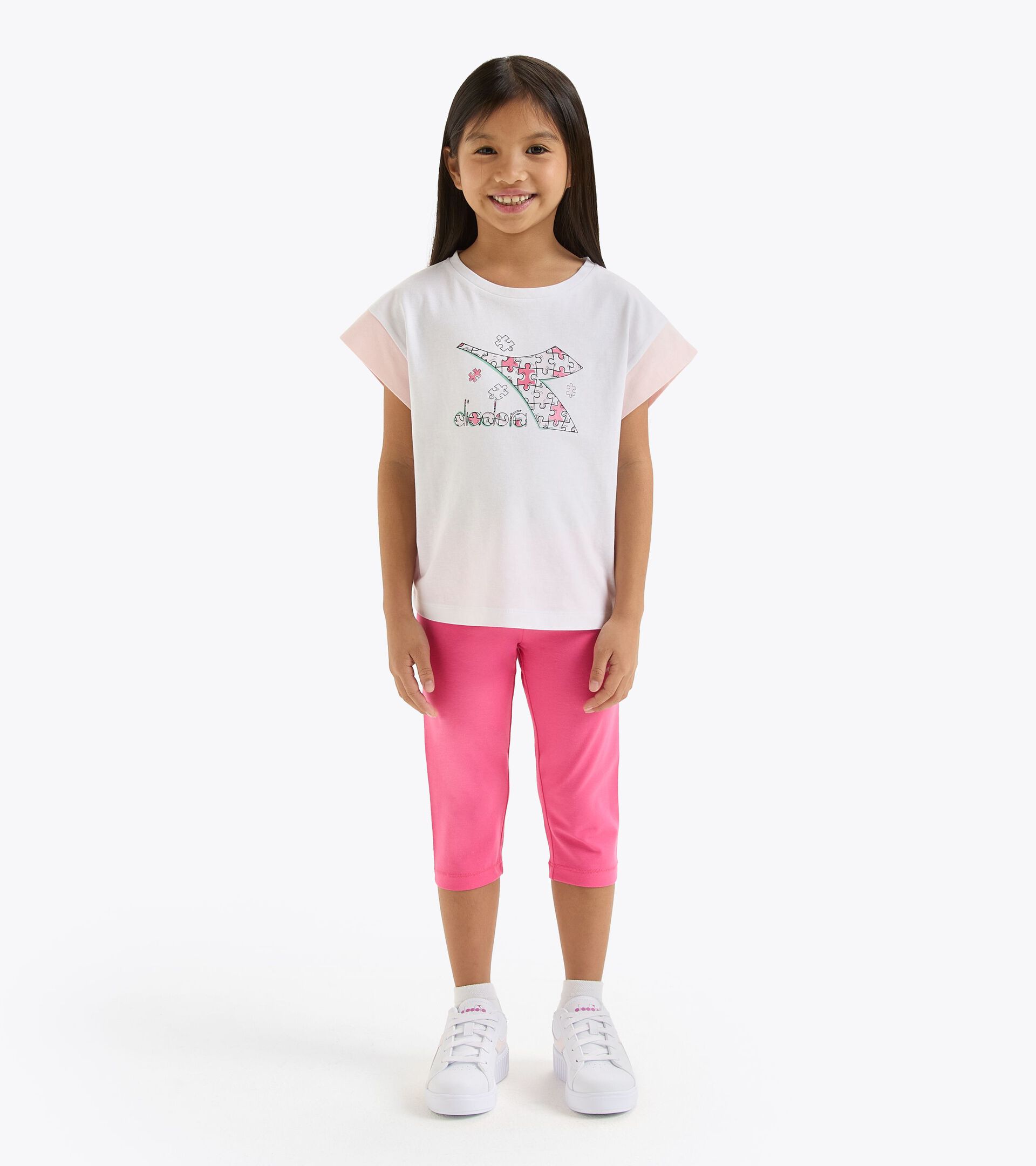 Sports set - T-shirt and leggings - Girl
 JG. SET SS PUZZLES SUPER WHITE/WILD ROSE - Diadora