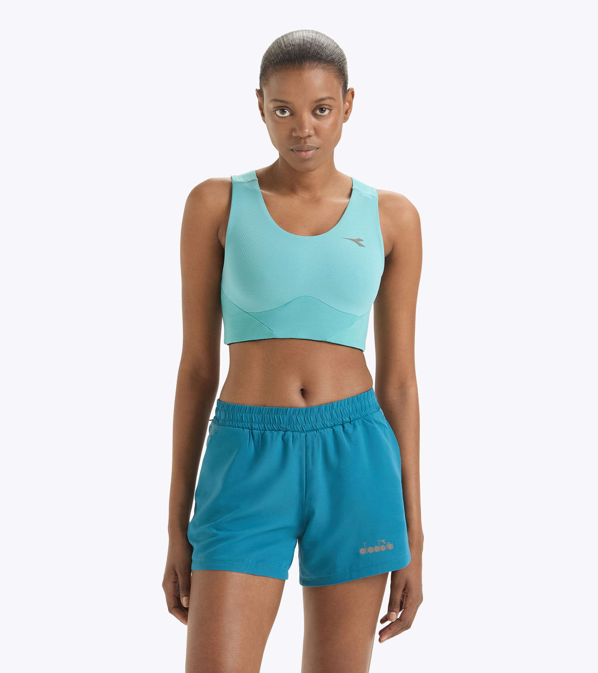 Soutien-gorge de sport - Femme L. MEDIUM BRA RUN CREW DUSTY TURQUOISE - Diadora