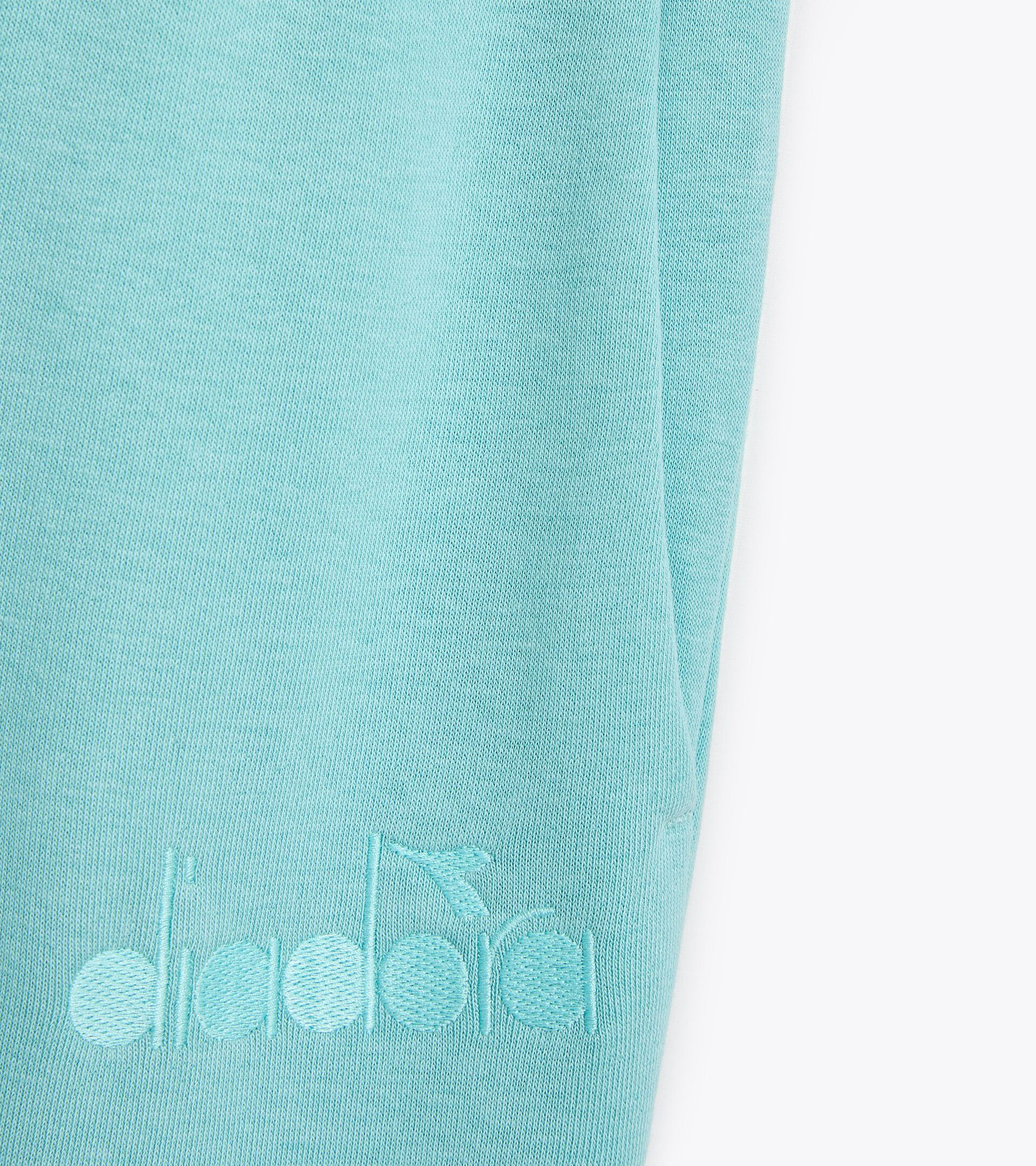 Jogger pants - Gender Neutral PANT ATHL. LOGO TURQUOISE (65135) - Diadora