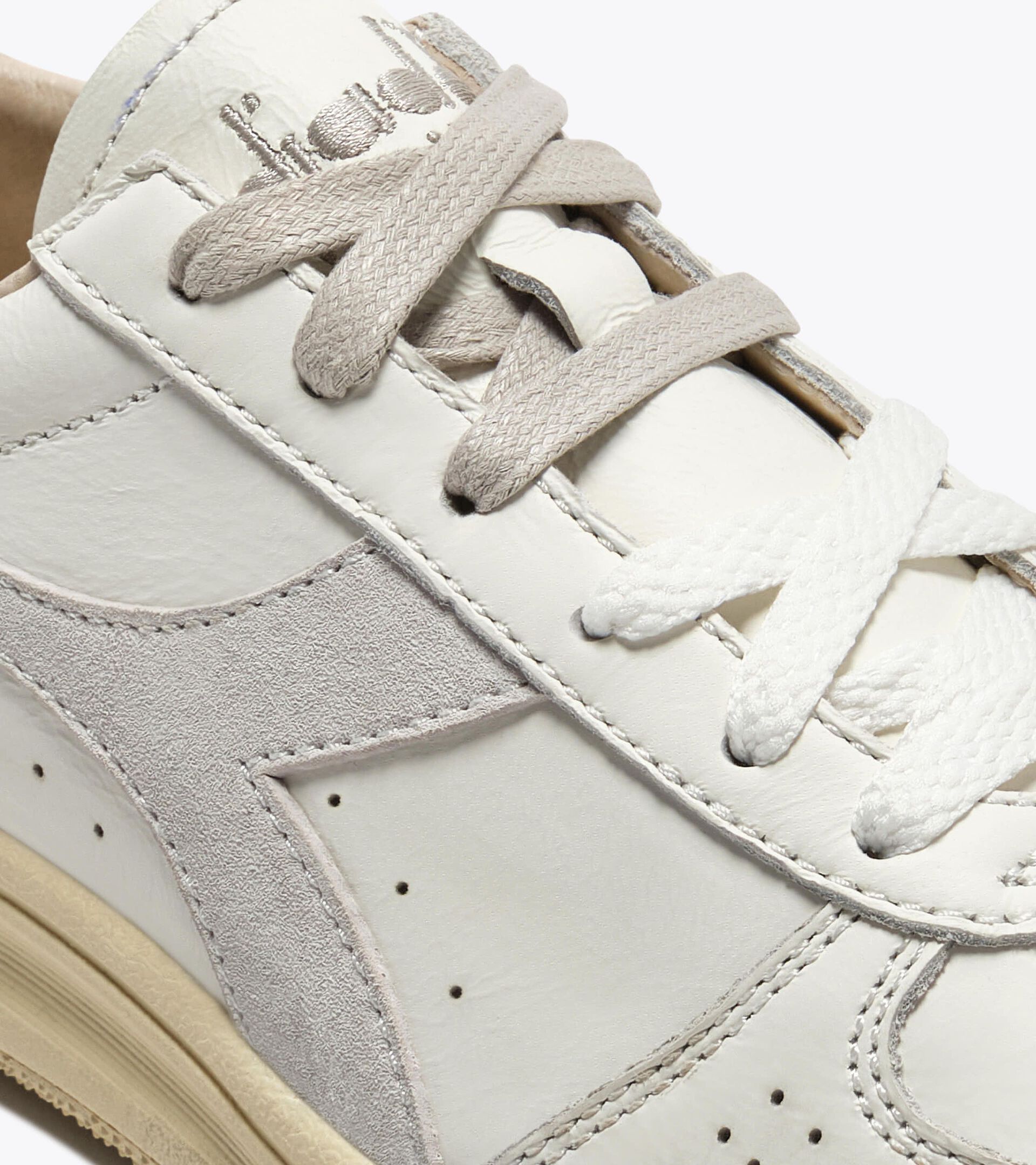 Heritage leather sneaker - All-gender
 B.ELITE X-STITCH WN WHITE/SILVER - Diadora