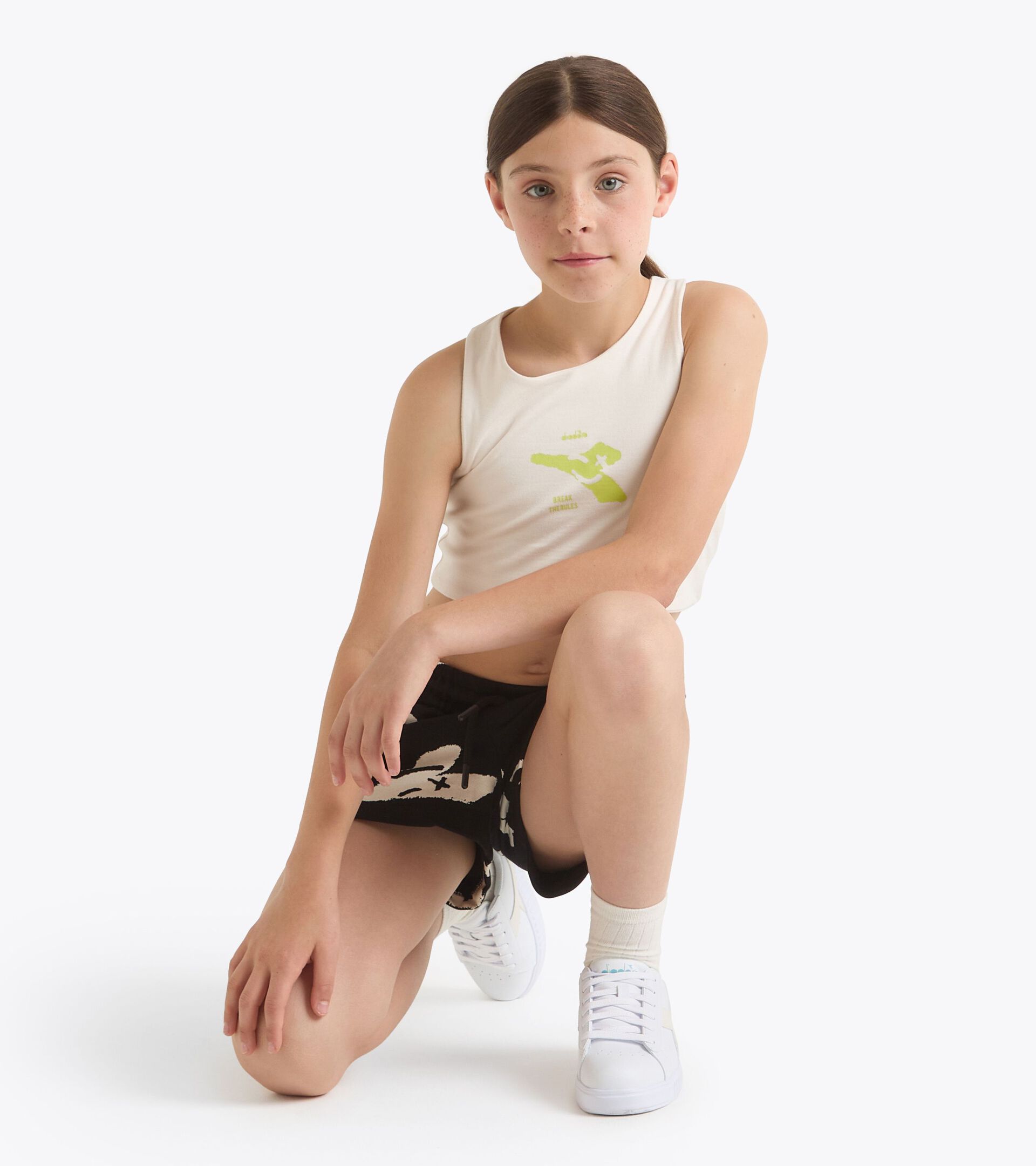 Cropped-T-Shirt mit Logo - Mädchen
JG. CROP TOP SMILE LOGO CREAM - Diadora