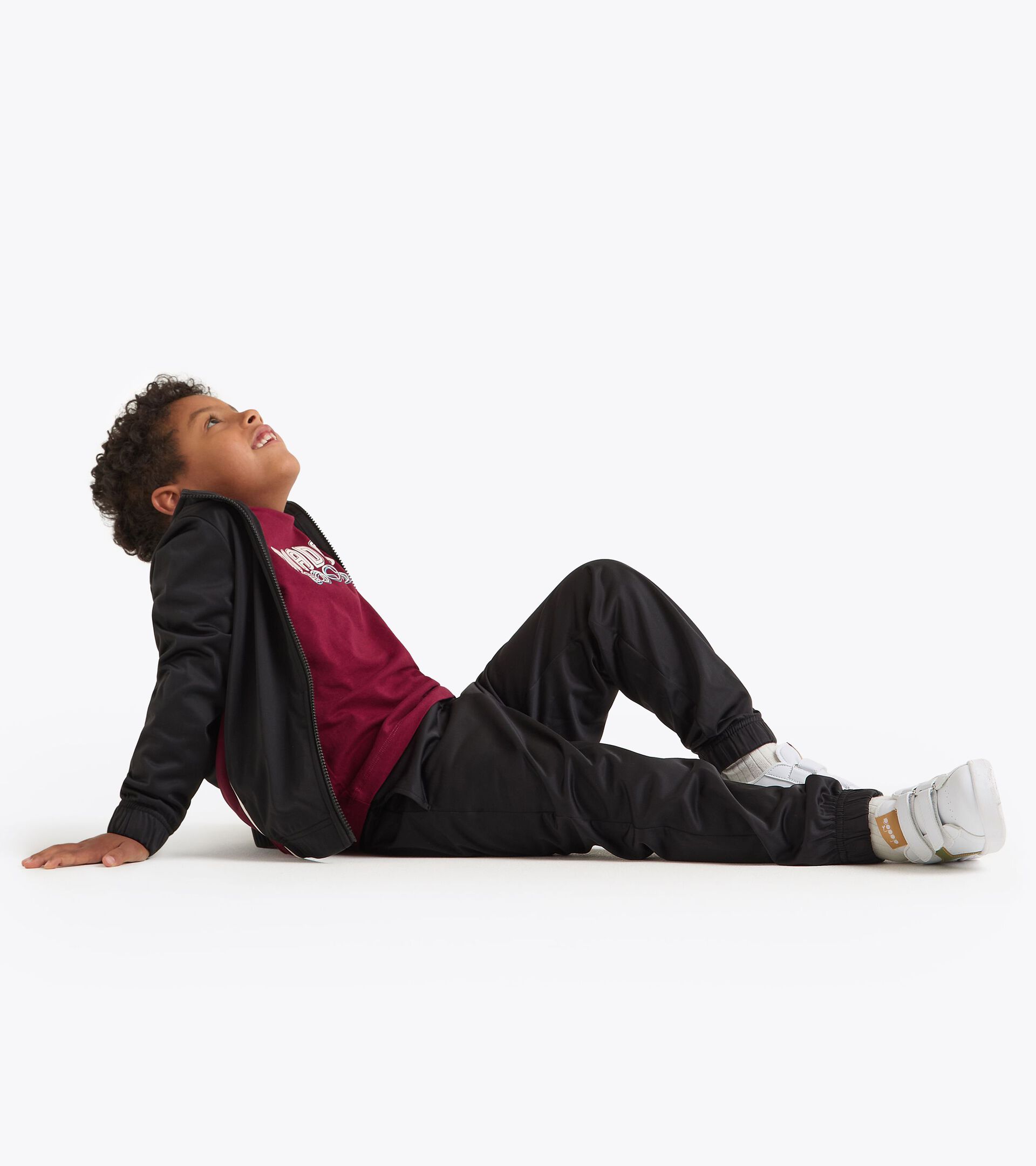 Polyestere tracksuit - Boy
 JB. TRACKSUIT FZ LOGO (PL) BLACK - Diadora