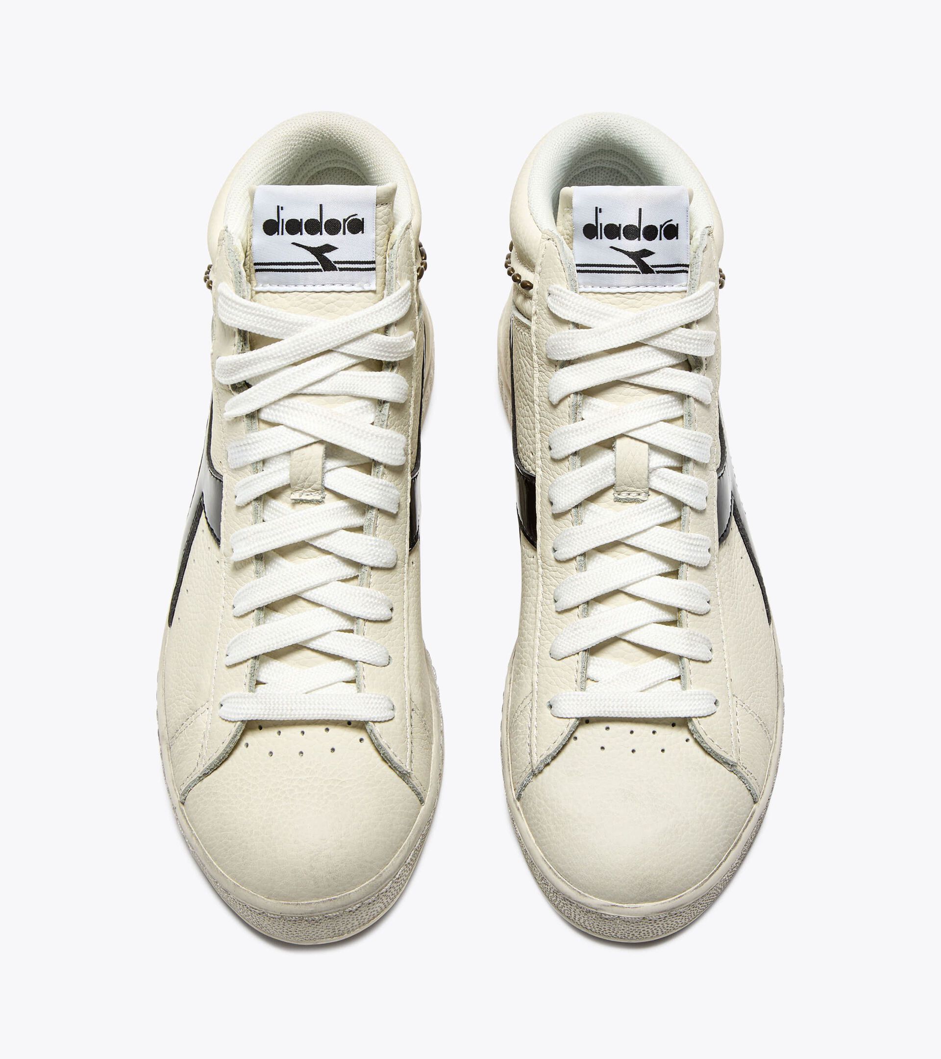 Zapatilla retro-tenis alta - Mujer GAME L HIGH WAXED STUDS WN BLANCO/NEGRO - Diadora