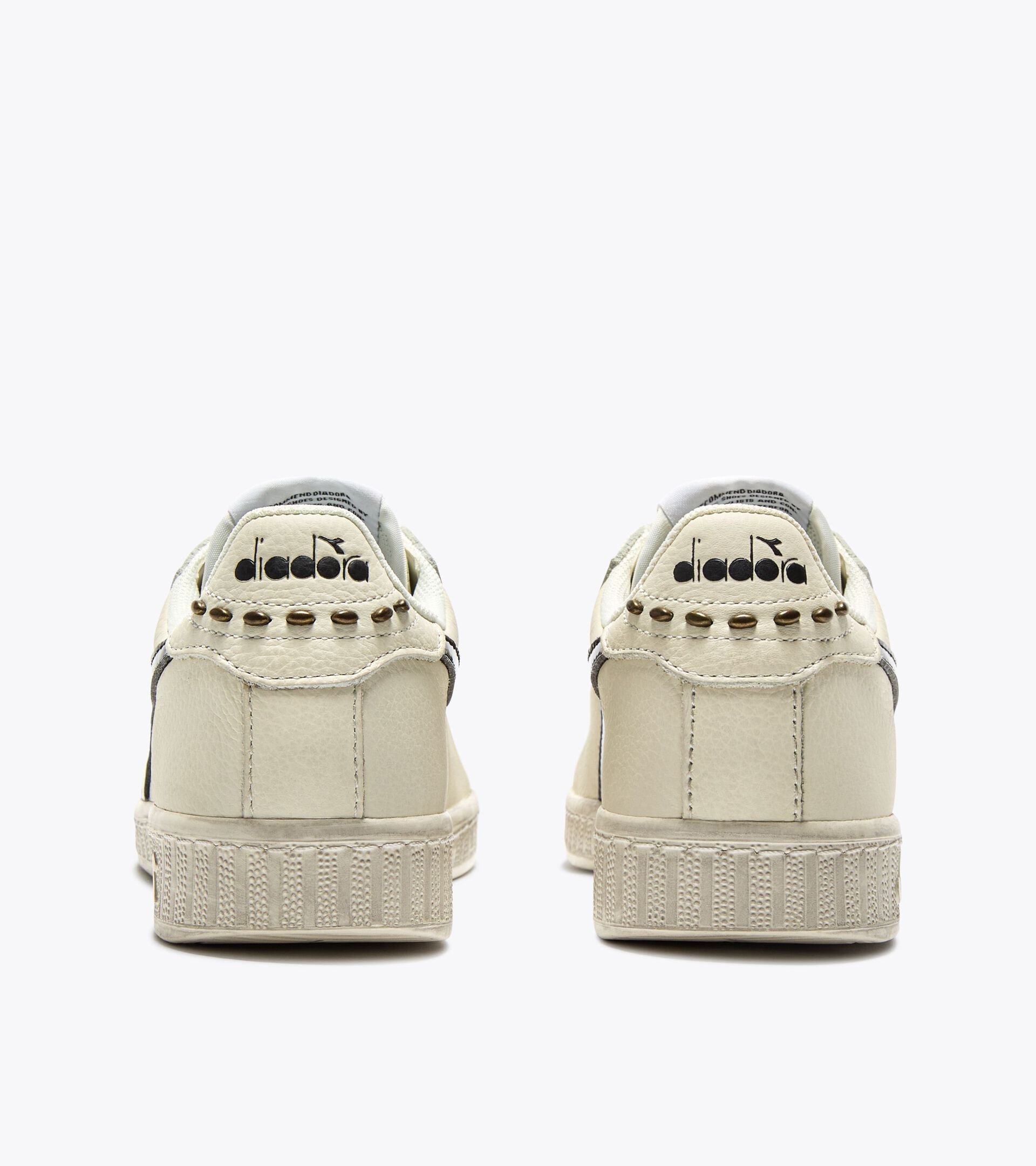 Sneaker sportiva in pelle - Donna 
 GAME L LOW WAXED STUDS WN BIANCO/NERO - Diadora