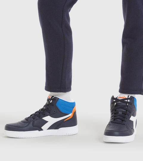 RAPTOR MID GS, BLUE CORSAIR/WHITE Sports shoes - Youth 8-16 years RAPTOR MID GS BLUE CORSAIR/WHITE - Diadora