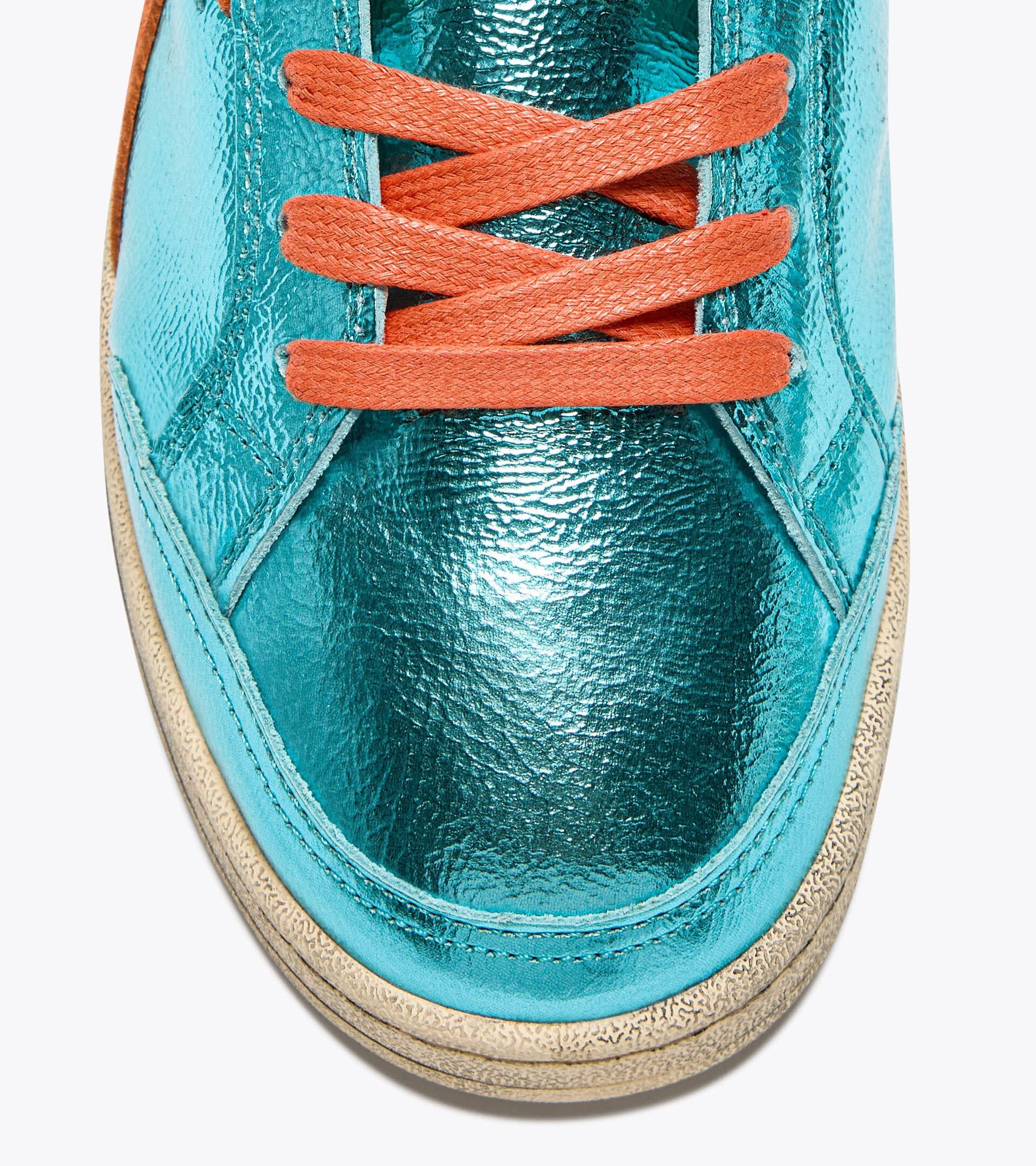 Sneaker Heritage aus metallisiertem Leder - Für alle Geschlechter
 PRESTIGE METAL USED BLAU CURACAO - Diadora