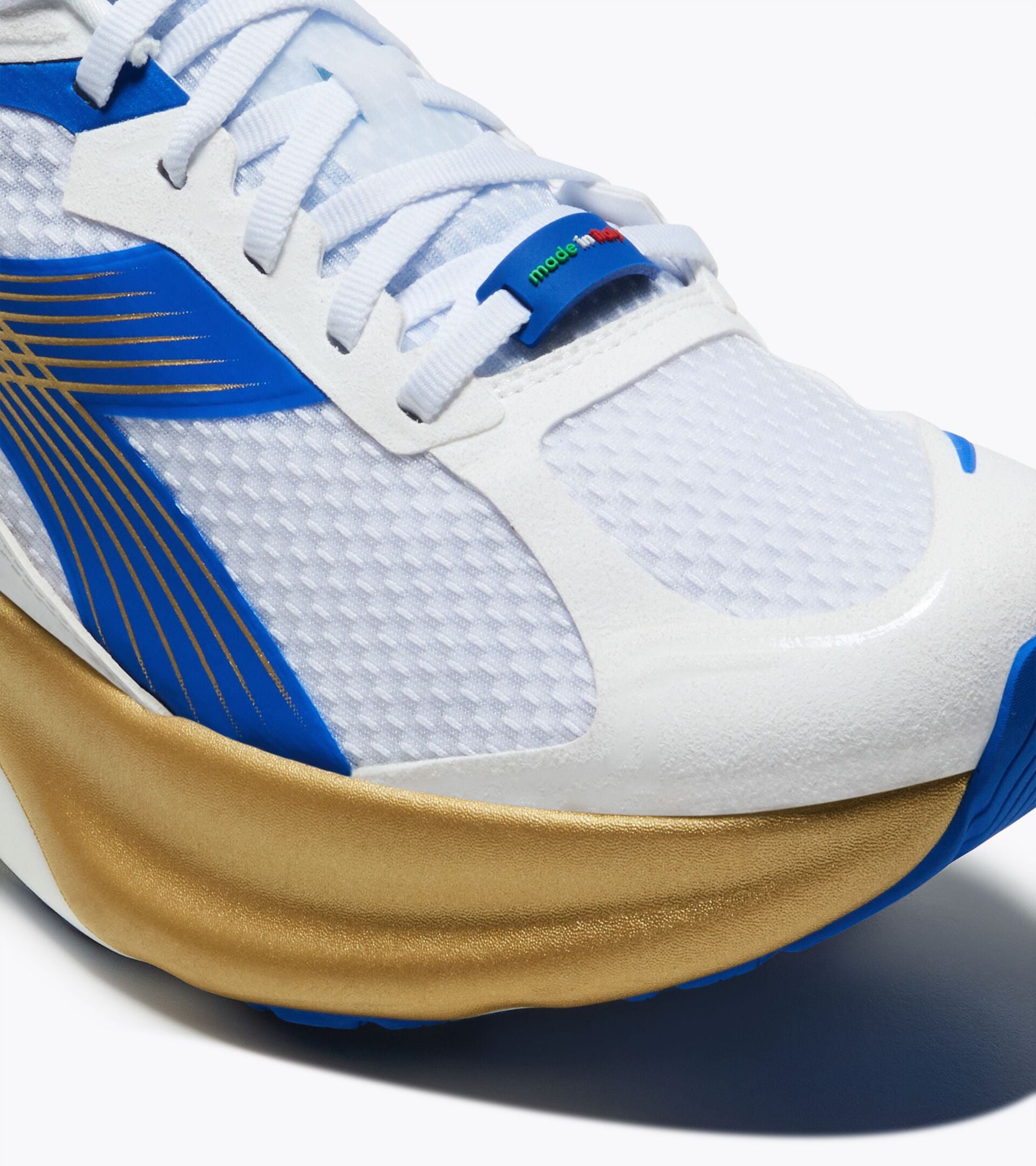 Made in Italy running shoe - Lightness and cushioning - All-Gender ATOMO STAR WHITE /ROYAL BLUE/GOLD - Diadora